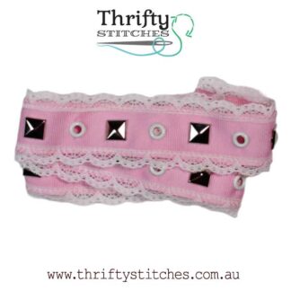 pink eyelet tape with pyramid studs